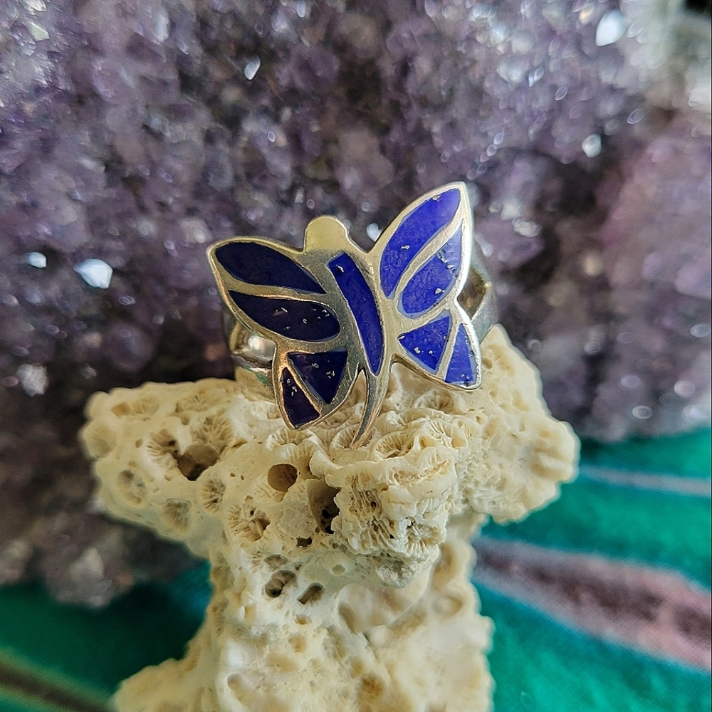 Sterling silver butterfly ring with inlaid lapis stone.